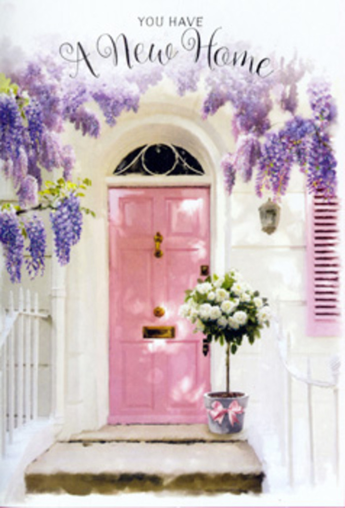 The scene captures a front door in Feltham at the very moment a house becomes a home: a softly painted pink door stands slightly recessed within whitewashed walls, its gentle colour humming with warmth rather than shouting for attention. Overhead, abundant wisteria in full lavender bloom drapes like a velvet curtain, the blossoms tumbling downward in loose, romantic clusters that frame the entrance in a haze of purple and lilac. The texture of each tiny flower is almost tangible, combining to create billowing, scented canopies that you can imagine brushing as you walk up the steps. To one side, a pale shutter echoes the blush tones of the door, tying the façade into a cohesive pastel composition reminiscent of a hidden courtyard off Hounslow Road. At the threshold, a stylish tin bucket sits proudly, filled with a generous bouquet of creamy white roses. The blooms are fully formed yet still fresh, their layered petals catching subtle highlights from the daylight and revealing hints of ivory and soft buttercream within the centres. Accents of lush green foliage wind between the roses, offering contrast and a natural, garden-picked feeling. Wrapped snugly around the base of the bucket, a slender pink ribbon is tied in an elegant bow, its satin edges shining softly and its tails resting lightly on the step, echoing the drape of the wisteria above. The overall atmosphere is one of poised optimism-the kind of comforting beauty you might choose when sending a new home greeting to someone settling near Feltham station or along local residential streets. It feels like a visual blessing at the doorway, a floral whisper that says, you've arrived, and this is where new memories will bloom.