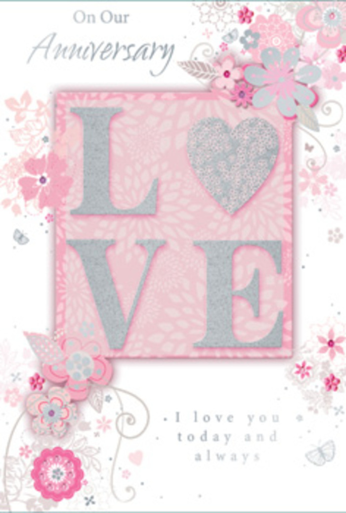 The anniversary card in this image feels like a carefully arranged bouquet captured on paper, the sort a couple in Feltham might place beside fresh flowers on a sideboard for days. At its heart, the word LOVE appears in bold, raised lettering, outlined in frosted glitter that catches every glint of available light. Each letter has a tactile quality, as if lightly cushioned beneath the fingertips, inviting the recipient to trace the word in a quiet, private moment. The background behind the motif is a gentle blush pink, softly graded so that it appears to glow from within, reminiscent of early sunrise over the green spaces around Feltham. Around this central word, fine, hand-drawn blooms unfurl in shades of pink, lilac, and ivory, their shapes airy and slightly whimsical, like ink sketches in a florist's notebook. Dainty leaves extend in slender arcs, while filigree lines and almost-hidden butterflies hover between the petals, suggesting the quiet flutter of contented hearts. These flourishes drift toward the card's borders, leaving just enough open space to frame the sentiment with calm and grace. Nestled beneath or beside the main design, the words I love you today and always appear in a gentle, flowing typeface that complements the floral curves. The overall feel is sunlit and serene, as though stepping into a room where love is woven into everyday life. This card would sit beautifully next to an anniversary arrangement delivered across Feltham, perhaps to a home near the River Crane, carrying with it a sense of gratitude, continuity, and deep affection.